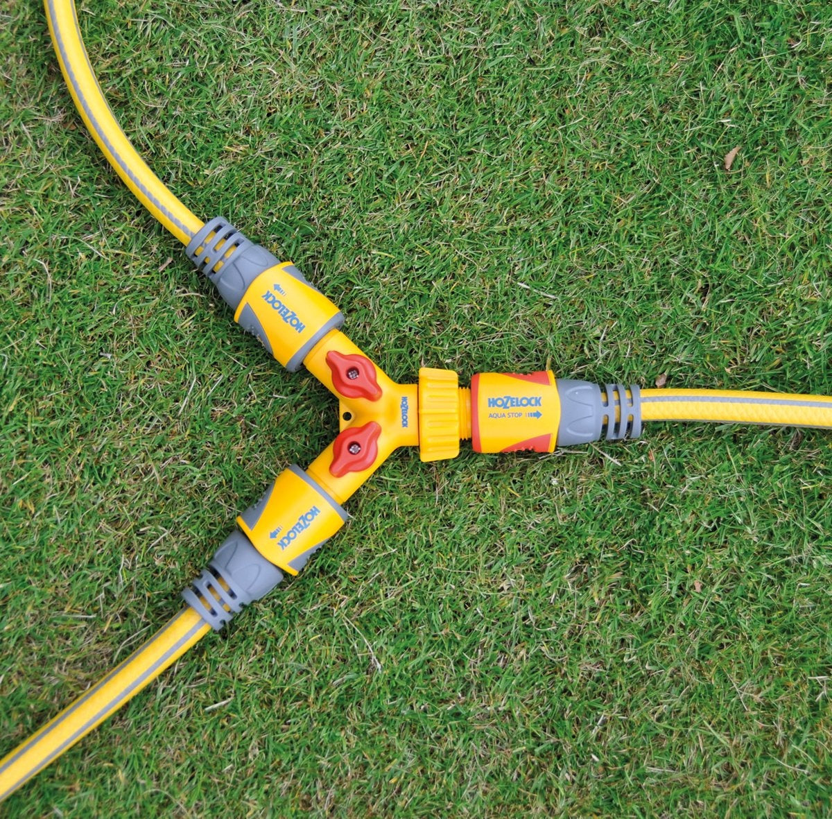 DUBBELE KRAANAANSLUITING 3/4" EN 1/2"