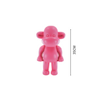 HOUSEVITAMIN BEELD THE LEGEND AAP POLYRESIN ROZE 35 CM