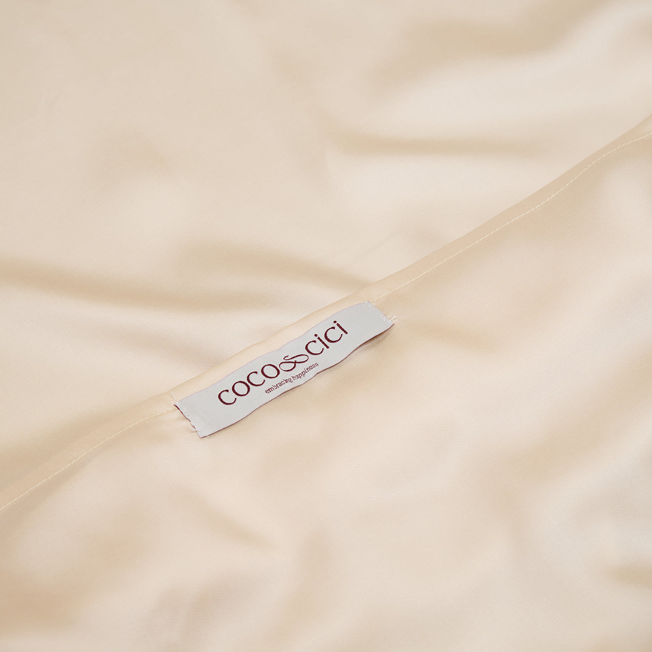 COCO & CICI - TENCEL SATEEN KUSSENSLOOP WIT ZAND