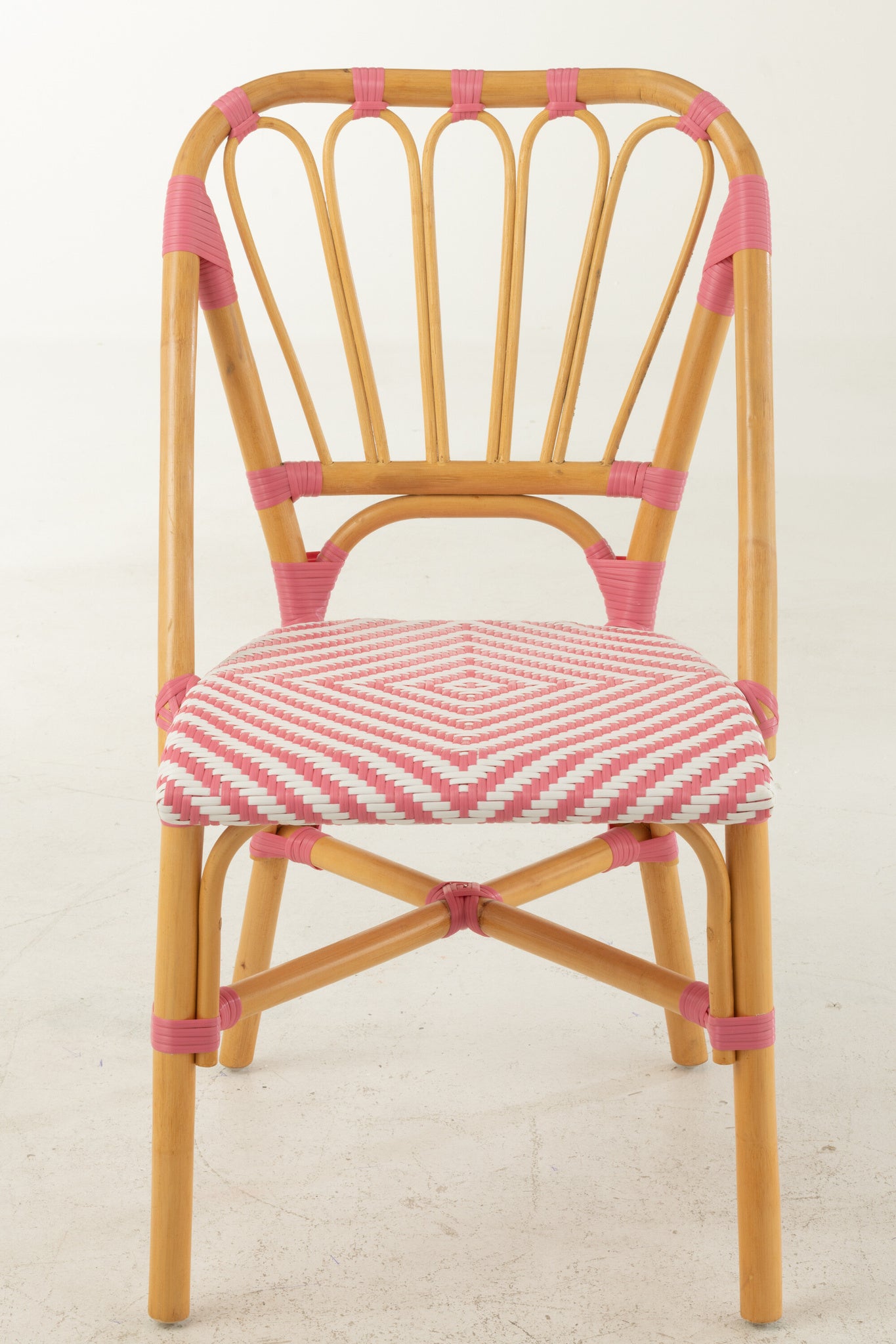 Eetkamerstoel rotan roze/wit